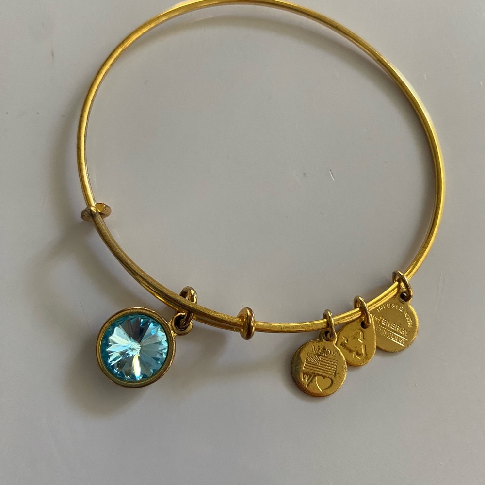 Alex and Ani Gold Bracelet with Blue Charm